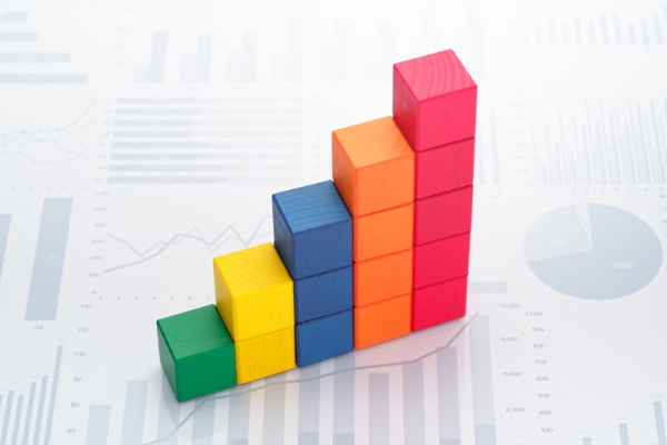 A stack of blocks representing increase in revenue by faster processing